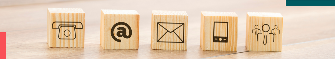 Banner image of Contact page featuring wood block icons in a row, from left to right the icons include telephone,  an @ symbol, an email icon, a cellphone and three officers